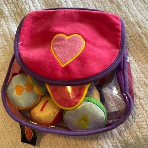 Melissa and Doug purse. Clear and pink.